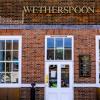 在酒吧连锁店与百威啤酒集团达成交易后Strongbow和John Smith's是将从Wetherspoon菜单中剔除的饮品之一